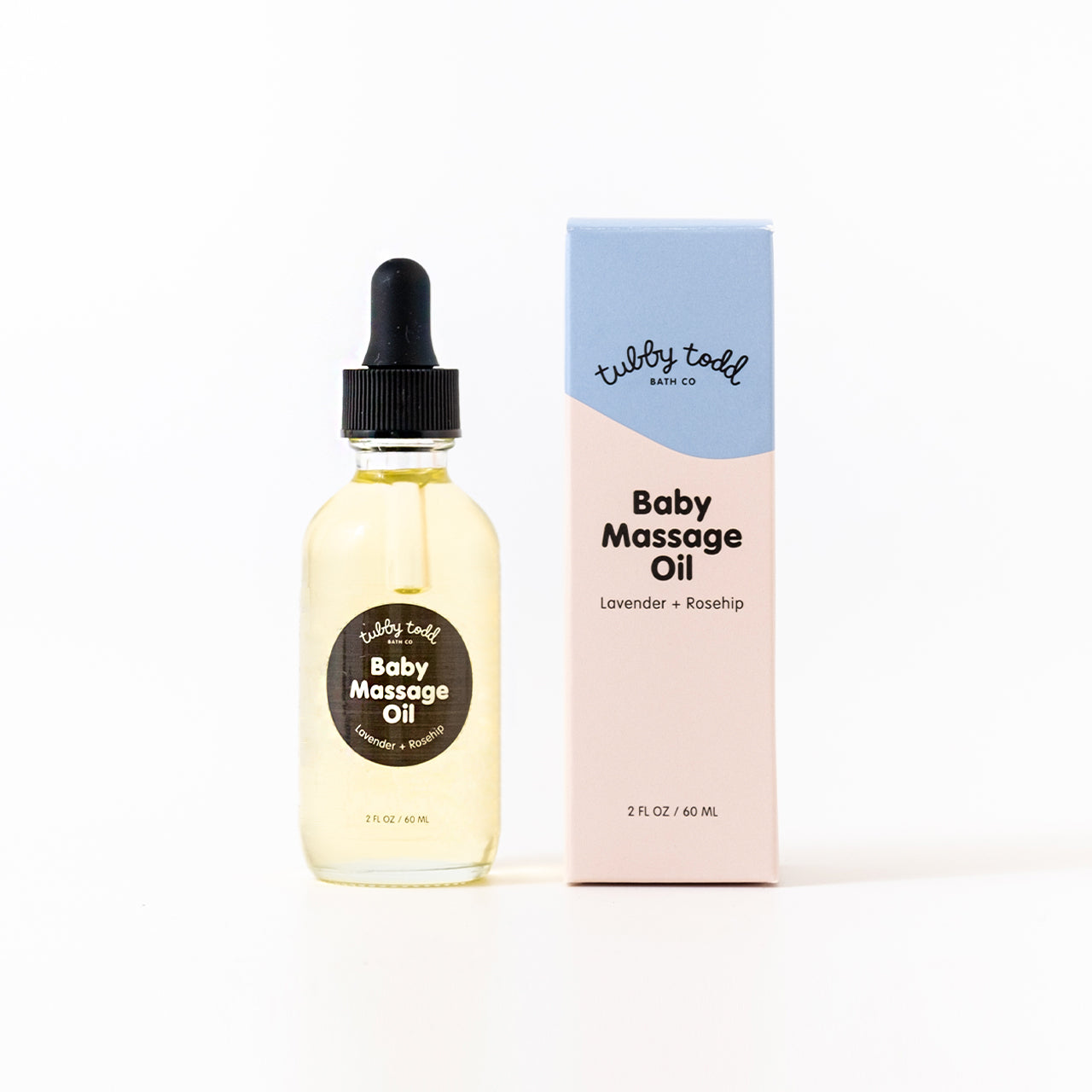 New Baby Massage Oil Bottle and box standing on the gray background.